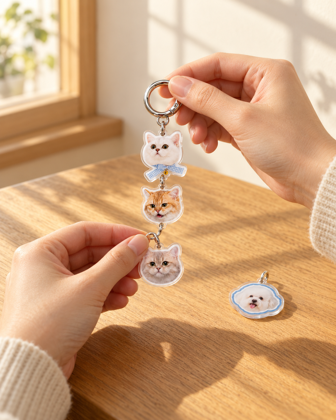 Assembling a multi-pet head charm keychain
