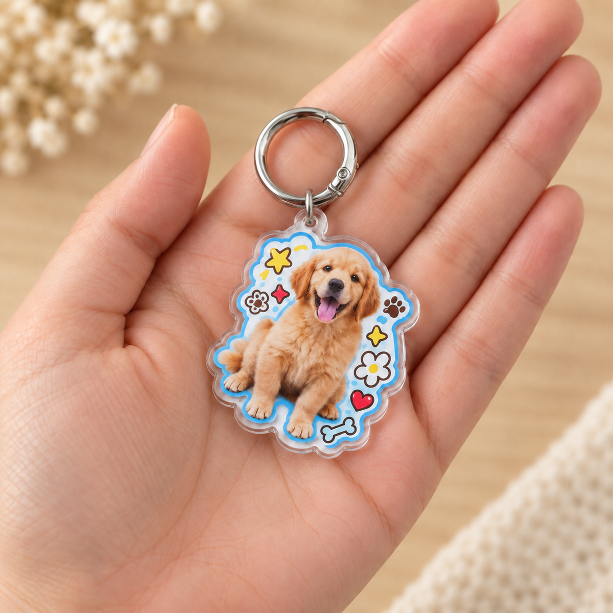 Acrylic Pet Photo Keychain — held in one palm for scale